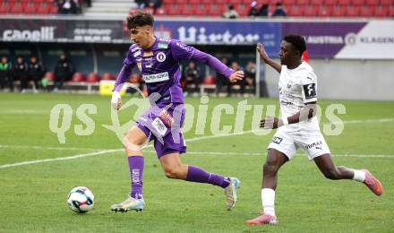 Fussball 2. Liga. SK Austria Klagenfurt gegen Amstetten.  Mario Matkovic  (Klagenfurt), Alieu Conateh  (Amstetten).  Klagenfurt, 22.11..2025.
Foto: Kuess
www.qspictures.net
---
pressefotos, pressefotografie, kuess, qs, qspictures, sport, bild, bilder, bilddatenbank