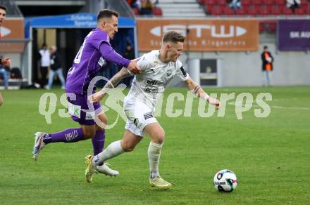 Fussball 2. Liga. SK Austria Klagenfurt gegen Amstetten.   Michael Lang (Klagenfurt),  Thomas Wilfried Mayer (Amstetten).  Klagenfurt, 22.11..2025.
Foto: Kuess
www.qspictures.net
---
pressefotos, pressefotografie, kuess, qs, qspictures, sport, bild, bilder, bilddatenbank