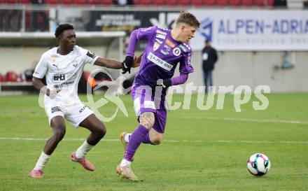 Fussball 2. Liga. SK Austria Klagenfurt gegen Amstetten.  Nik Marinsek  (Klagenfurt),  Alieu Conateh  (Amstetten).  Klagenfurt, 22.11..2025.
Foto: Kuess
www.qspictures.net
---
pressefotos, pressefotografie, kuess, qs, qspictures, sport, bild, bilder, bilddatenbank