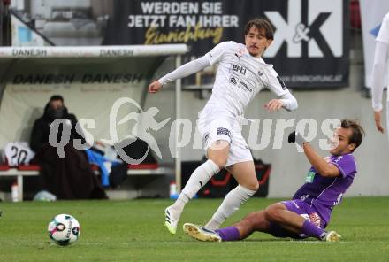 Fussball 2. Liga. SK Austria Klagenfurt gegen Amstetten.  Leo Vielgut  (Klagenfurt), Joshua Steiger  (Amstetten).  Klagenfurt, 22.11..2025.
Foto: Kuess
www.qspictures.net
---
pressefotos, pressefotografie, kuess, qs, qspictures, sport, bild, bilder, bilddatenbank