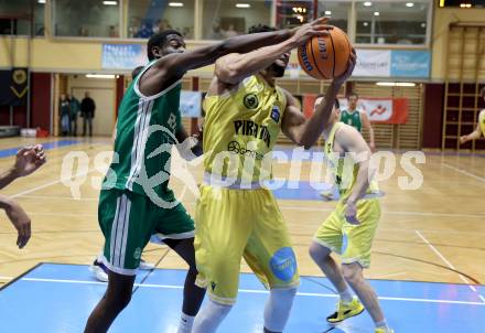 Basketball 2. Liga 2025/2026. Grunddurchgang 12. Runde.  Woerthersee Piraten gegen Basketball Klub Rapid Wien. Marcus Holyfield  (Piraten),  David Ilunga Zola (Wien). Klagenfurt, am 6.1.2026
Foto: Kuess
---
pressefotos, pressefotografie, kuess, qs, qspictures, sport, bild, bilder, bilddatenbank