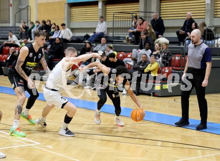 Basketball 2. Liga 2025/2026. Grunddurchgang 13. Runde.  KOS Celovec gegen BK Mattersburg Rocks. Jernej Andolsek Heine  (KOS),  Aleksandar Andjelkovic, Yann Grandperret (Mattersburg). Klagenfurt, am 10.1.2026
Foto: Kuess
---
pressefotos, pressefotografie, kuess, qs, qspictures, sport, bild, bilder, bilddatenbank