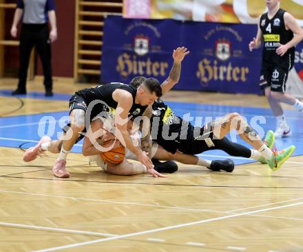 Basketball 2. Liga 2025/2026. Grunddurchgang 13. Runde.  KOS Celovec gegen BK Mattersburg Rocks.  Samuel Seher (KOS), Aleksandar Andjelkovic, Petar Zivkovic  (Mattersburg). Klagenfurt, am 10.1.2026
Foto: Kuess
---
pressefotos, pressefotografie, kuess, qs, qspictures, sport, bild, bilder, bilddatenbank