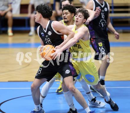 Basketball 2. Liga 2025/2026. Grunddurchgang 15. Runde.  Woerthersee Piraten gegen Vienna United.  Elias Podany (Piraten), Sebastian Mailath-Pokorny  (Vienna). Klagenfurt, am 24.1.2026
Foto: Kuess
---
pressefotos, pressefotografie, kuess, qs, qspictures, sport, bild, bilder, bilddatenbank