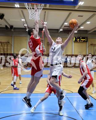 Basketball 2. Liga 2025/2026. Grunddurchgang 16. Runde.  KOS Celovec gegen Upper Austrian Ballers.  Jernej Andolsek Heine   (KOS),   Luis Streitberger (Austrian Ballers). Klagenfurt, am 31.1.2026
Foto: Kuess
---
pressefotos, pressefotografie, kuess, qs, qspictures, sport, bild, bilder, bilddatenbank