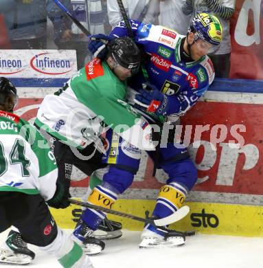 Eishockey ICE Bundesliga.  Winn2day ICE Hockey League. VSV gegen Olimpija Ljubljana. Guus Van Nes   (VSV),  Jan Cosic  (Laibach). Klagenfurt, am 1.2..2026
Foto: Kuess
www.qspictures.net
---
pressefotos, pressefotografie, kuess, qs, qspictures, sport, bild, bilder, bilddatenbank