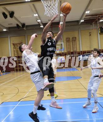 Basketball 2. Liga 2025/2026. Grunddurchgang 21. Runde.  KOS gegen Woerthersee Piraten.    Samuel Seher (KOS),  Marcus Holyfield (Piraten). Klagenfurt, am 8.3.2026
Foto: Kuess
---
pressefotos, pressefotografie, kuess, qs, qspictures, sport, bild, bilder, bilddatenbank