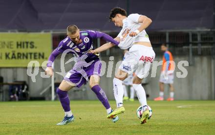Fussball 2. Liga. SK Austria Klagenfurt gegen FAC Wien.  Bartol Barisic, (Klagenfurt),  Simon Filipovic    (FAC Wien).  Klagenfurt, 13.3.2026.
Foto: Kuess
www.qspictures.net
---
pressefotos, pressefotografie, kuess, qs, qspictures, sport, bild, bilder, bilddatenbank