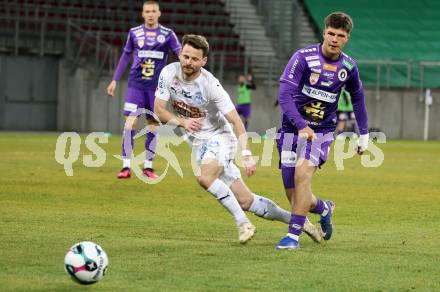 Fussball 2. Liga. SK Austria Klagenfurt gegen FAC Wien.  Dino Delic, (Klagenfurt),  Marcus Maier    (FAC Wien).  Klagenfurt, 13.3.2026.
Foto: Kuess
www.qspictures.net
---
pressefotos, pressefotografie, kuess, qs, qspictures, sport, bild, bilder, bilddatenbank
