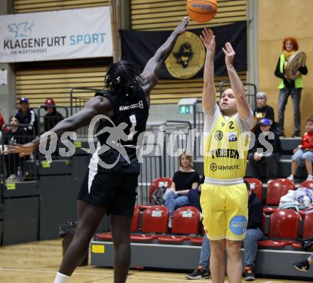 Basketball 2. Liga 2025/2026. Grunddurchgang 22. Runde.   Woerthersee Piraten gegen RAIDERS Tirol.   Tim Huber (Piraten),  Dennis Acheampong  (Tirol). Klagenfurt, am 14.3.2026
Foto: Kuess
---
pressefotos, pressefotografie, kuess, qs, qspictures, sport, bild, bilder, bilddatenbank