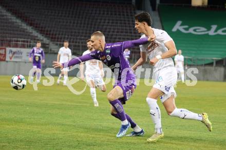 Fussball 2. Liga. SK Austria Klagenfurt gegen FAC Wien. Bartol Barisic  (Klagenfurt),  Simon Filipovic  (FAC). Klagenfurt, 13.3.2026.
Foto: Kuess
www.qspictures.net
---
pressefotos, pressefotografie, kuess, qs, qspictures, sport, bild, bilder, bilddatenbank