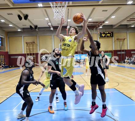 Basketball 2. Liga 2025/2026. Grunddurchgang 22. Runde.   Woerthersee Piraten gegen RAIDERS Tirol.  Lukas Simoner  (Piraten),  Justin Charles Andrew (Tirol). Klagenfurt, am 14.3.2026
Foto: Kuess
---
pressefotos, pressefotografie, kuess, qs, qspictures, sport, bild, bilder, bilddatenbank