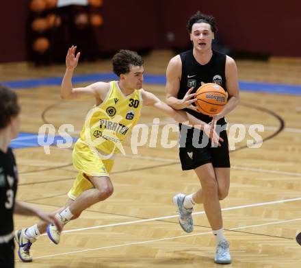 Basketball 2. Liga 2025/2026. Grunddurchgang 22. Runde.   Woerthersee Piraten gegen RAIDERS Tirol.  Matheo Brandstaetter  (Piraten), Marko Spasojevic  (Tirol). Klagenfurt, am 14.3.2026
Foto: Kuess
---
pressefotos, pressefotografie, kuess, qs, qspictures, sport, bild, bilder, bilddatenbank